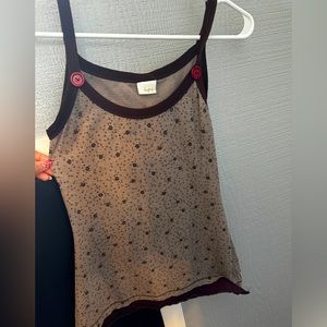 Really cute top with red buttons